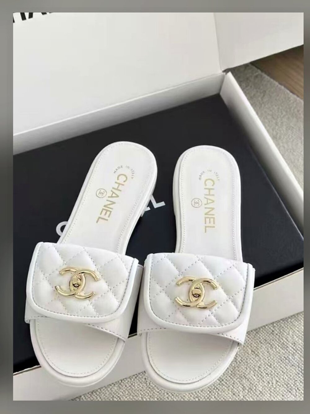 CHANEL White Quilted CC Turnlock Slide Sandals
